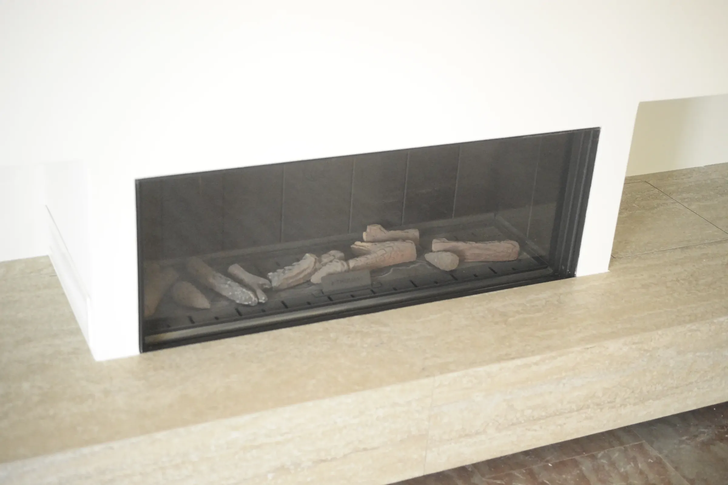 A close view of the metal frame, stone base and precise junctions.